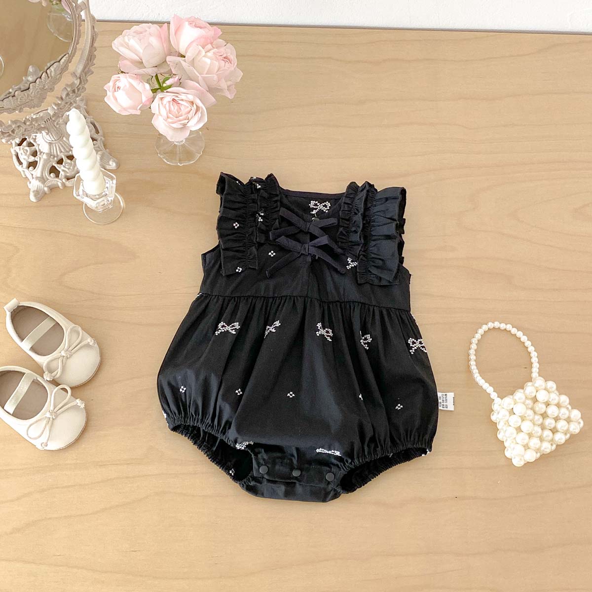Baby Clothing Online - Macacão Preto com Estampa de Laço