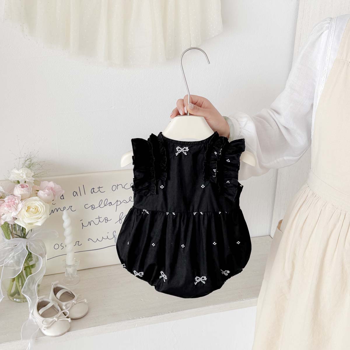 Macacão Preto com Estampa de L - Baby Clothing Online avaliação e preço